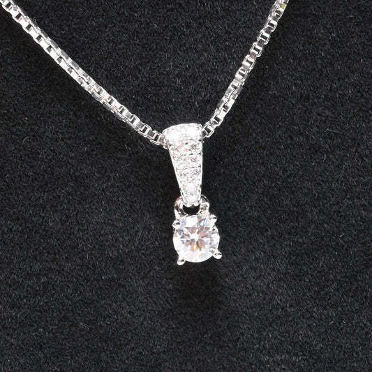 Pure Brilliance · 0.25ct Round Moissanite Pendant · Sterling Silver