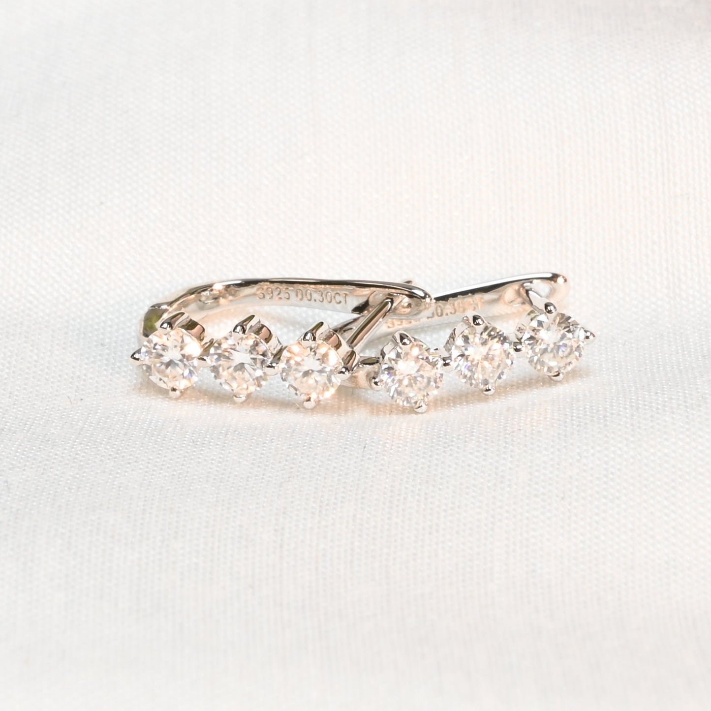 Pure Brilliance · 3-Stone Moissanite Dangle Earrings · Sterling Silver