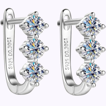 Pure Brilliance · 3-Stone Moissanite Dangle Earrings · Sterling Silver