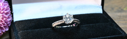 Pure Brilliance · 1ct Moissanite Solitaire Engagement Ring with Side Accents · Sterling Silver · Size 6